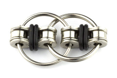 Tom's Fidgets Original Flippy Chain Fidget Toy — black closeup shows sturdy links for durable daily use.