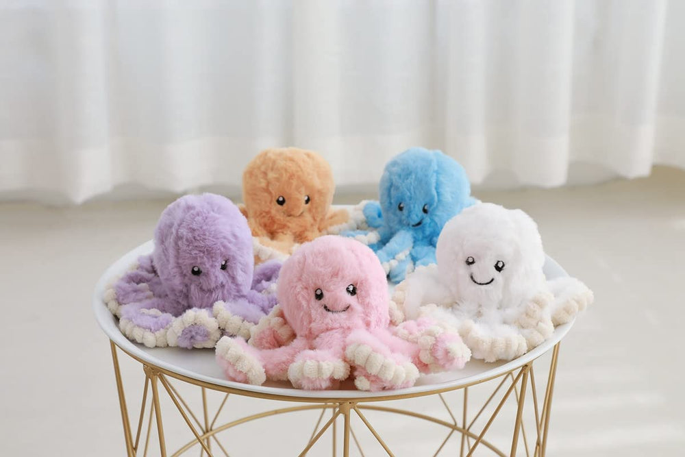 TONGSONG blue 31.5-inch octopus plush brightens play corners with whimsy.