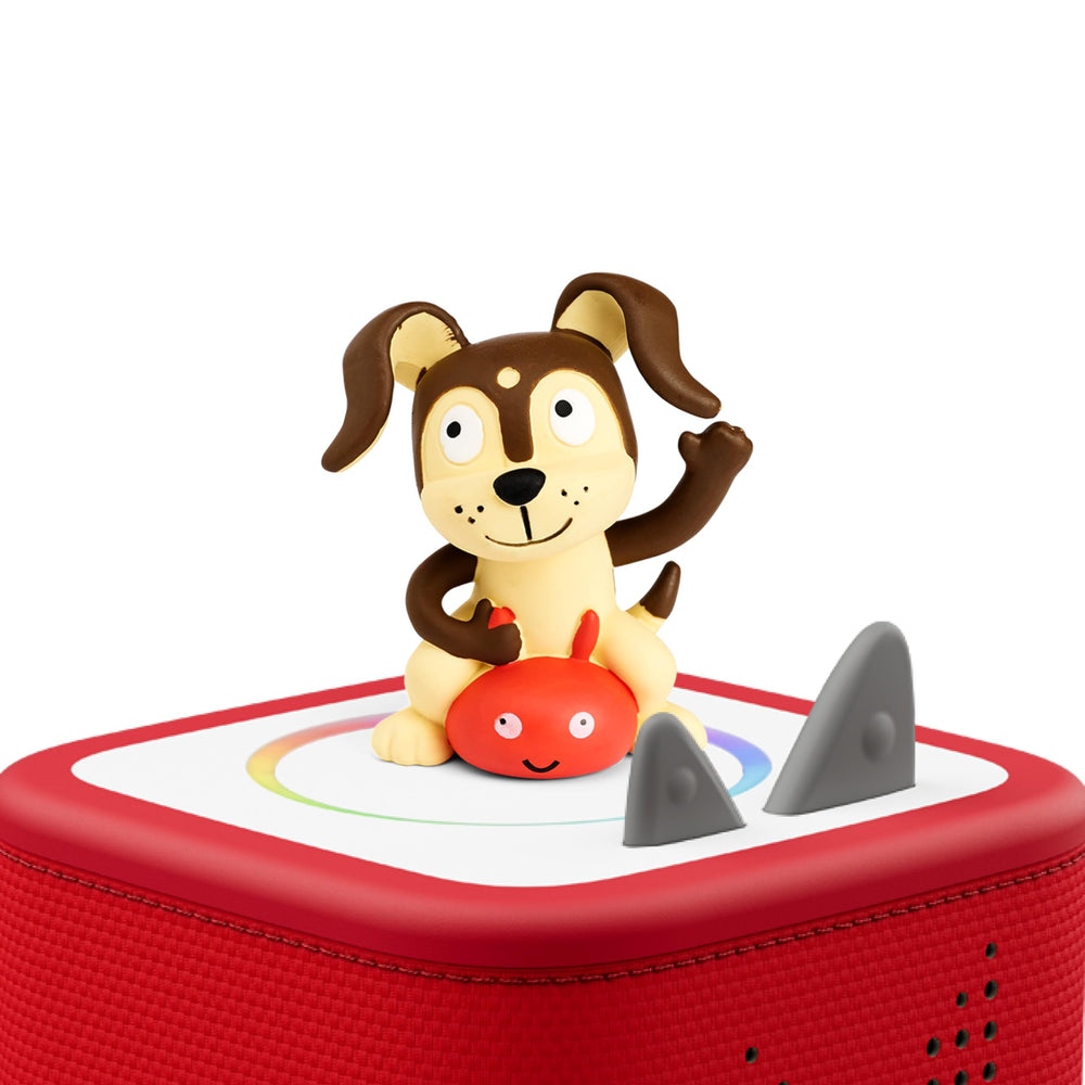Tonies Playtime Puppy figurine side profile displayed beside a Toniebox