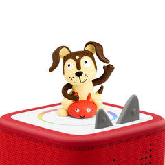 Tonies Playtime Puppy figurine side profile displayed beside a Toniebox