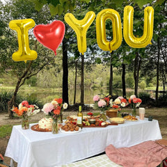 TONIFUL 40in U balloon in gold completes a romantic letter set.