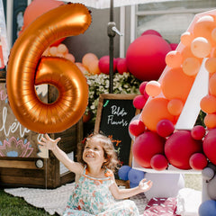 TONIFUL birthday party orange 40-inch balloon creates impressive focal point.