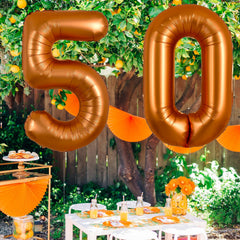 TONIFUL orange number balloon with a shiny, reflective foil surface
