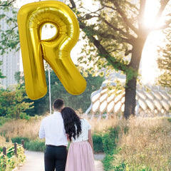 TONIFUL gold letter R balloon used in birthday decor