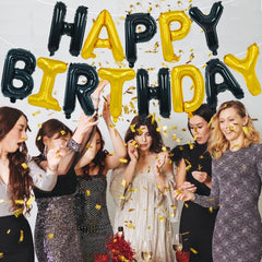 TONIFUL black gold themed decor creates a chic party backdrop
