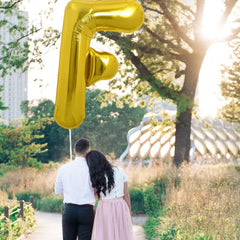 Toniful elegant gold letter F balloon setup for photos