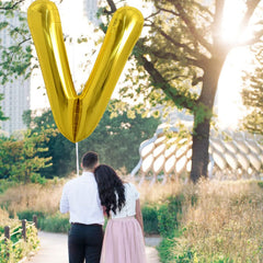 TONIFUL wedding foil balloon V enhances backdrops with a luxury vibe.