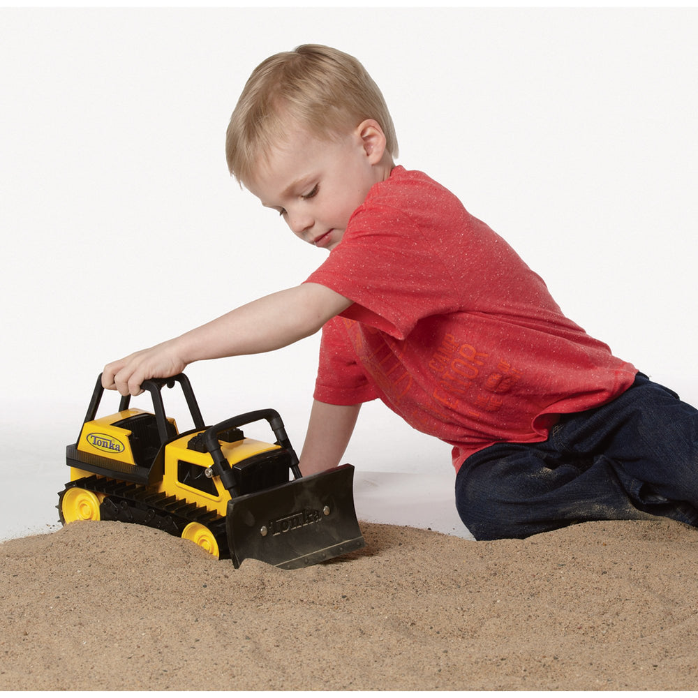 Tonka steel bulldozer closeup reveals sturdy finish for long-lasting use