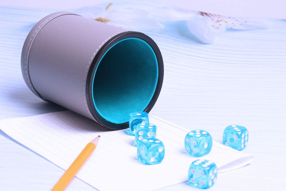 Six 16mm blue dice included for ready-to-play games.