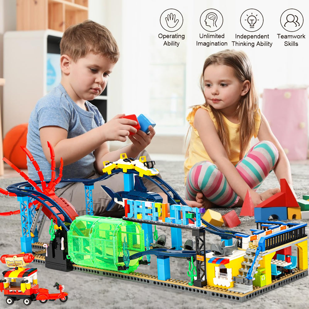 TOY PLAYER Aquarium theme buildings along a curved roller coaster track
