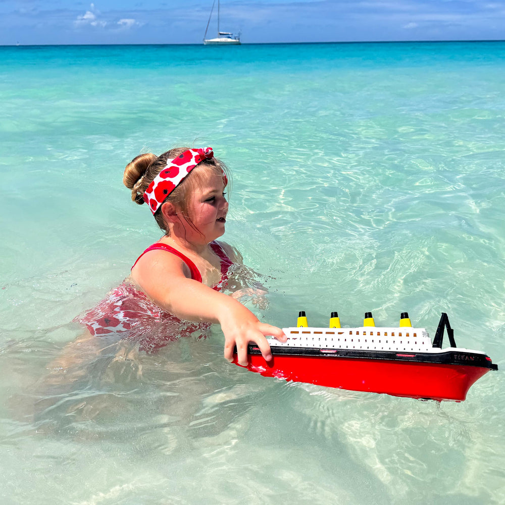 Toyland Titanic boat bath time toy inspiring storytelling and creative play.
