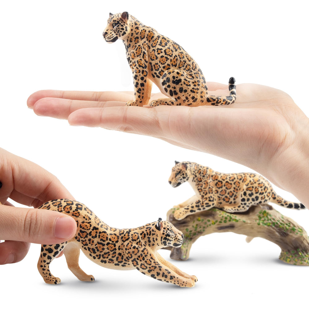 Toymany leopards with tree trunk scene inspire diorama-style play.