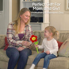 Smiley-face companion on a plush flower supports comforting play during separation.