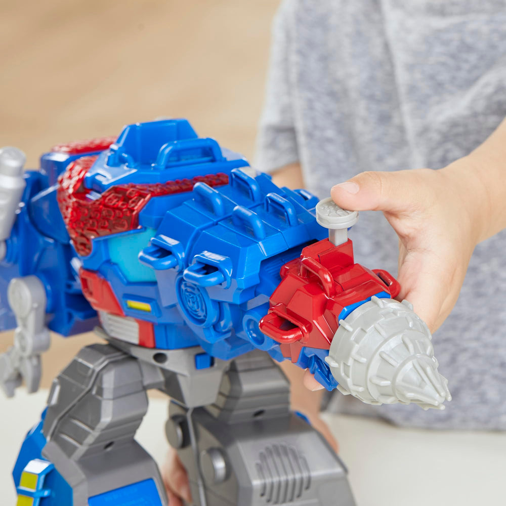 Transformers Dinobot Adventures Optimus Prime T-Rex reveal, highlighting dynamic dinosaur play.