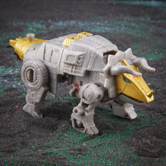 Transformers Dinobot Slug with other Dinobot figures for collection.