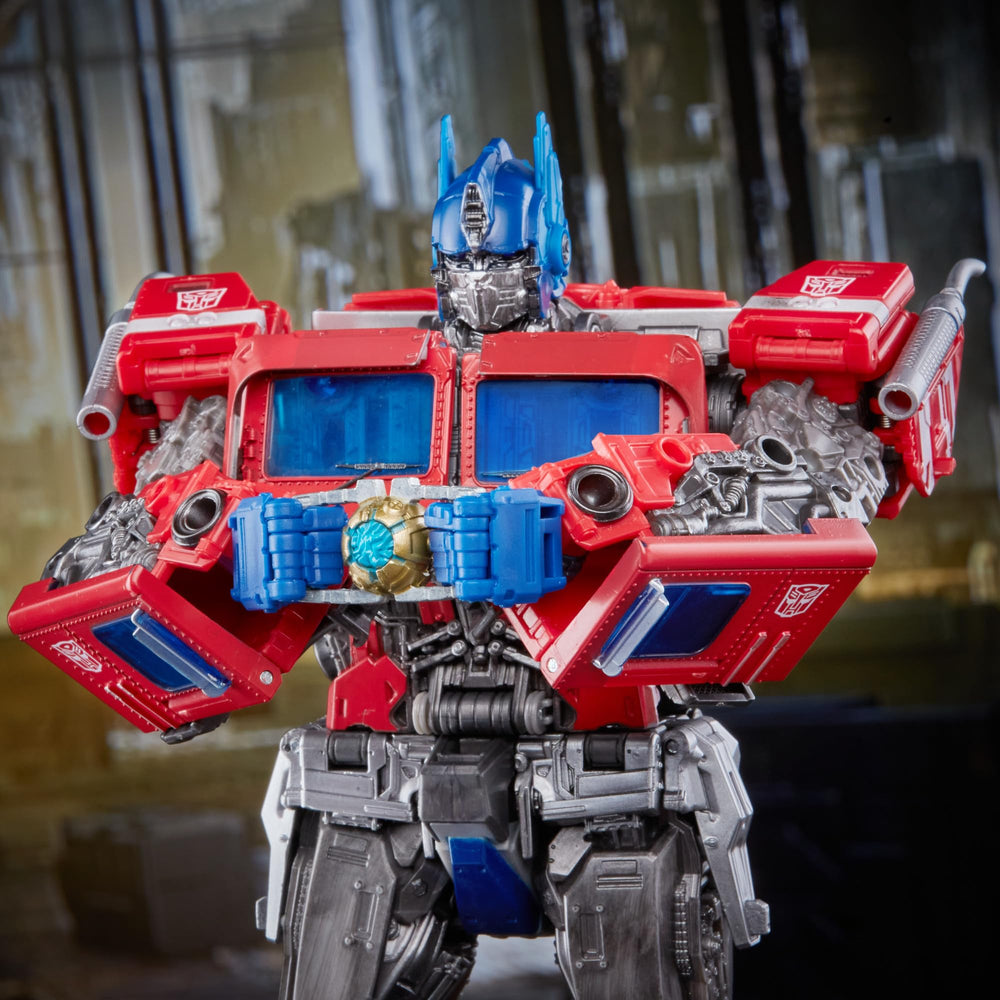Transformers MPM12 Optimus Prime diecast parts add weight for balanced display.