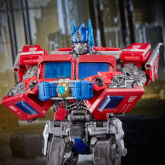 Transformers MPM12 Optimus Prime diecast parts add weight for balanced display.