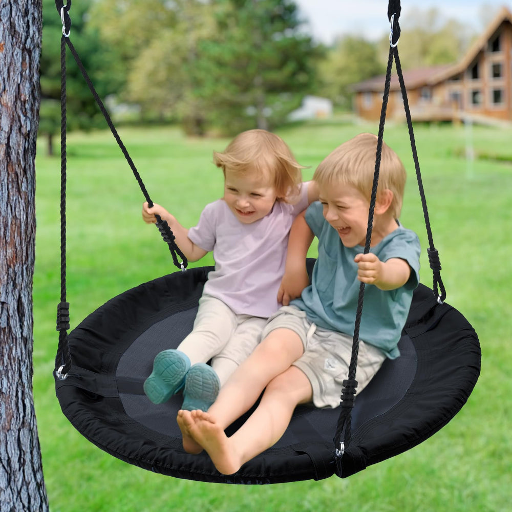 Trekassy saucer swing suitable for kids and adults for backyard fun.