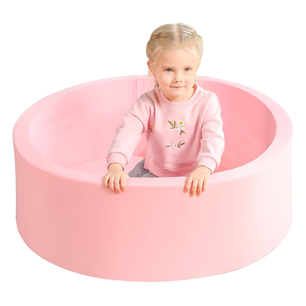 Trendbox memory foam round ball pit in light pink, soft toddler surface.