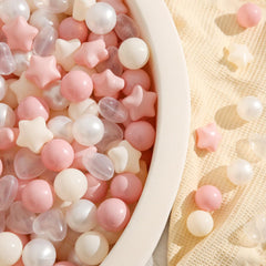 TRENDPLAY Heart shapes in pink add festive touch to pit play