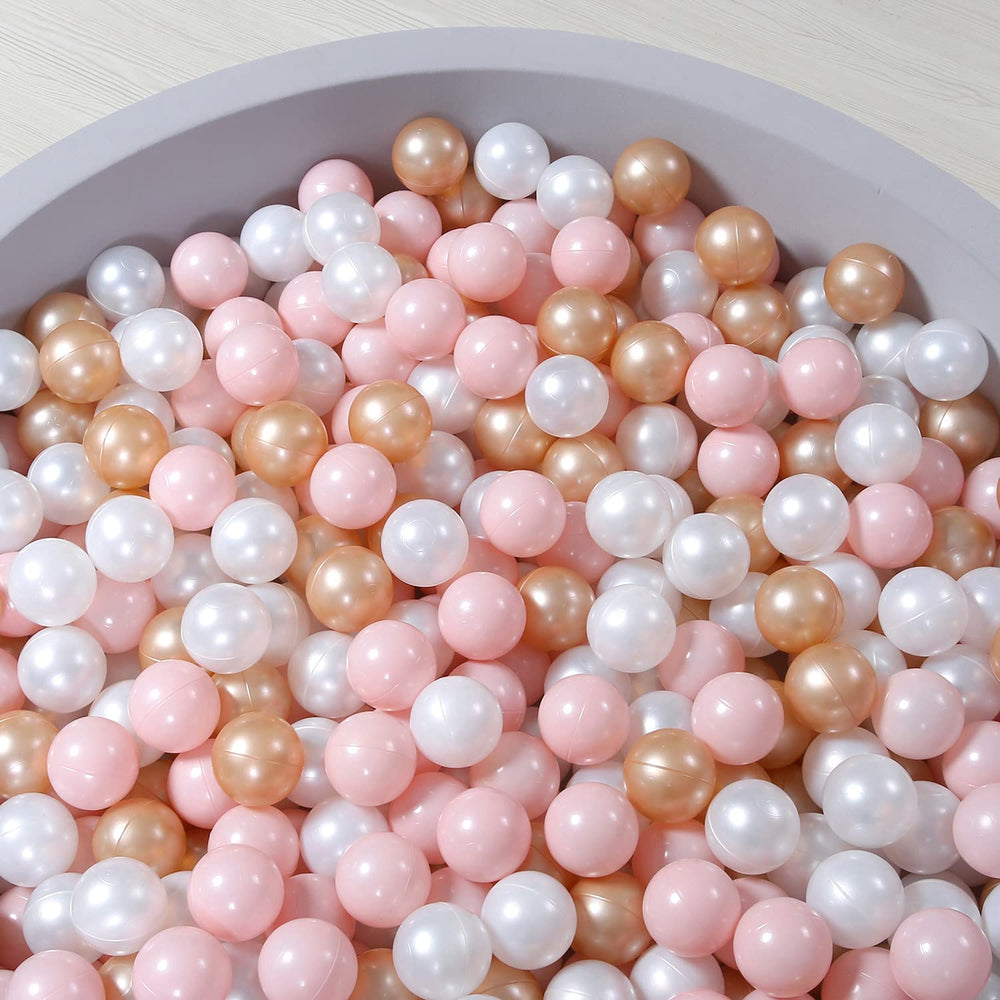 Colorful mix of pink, pearl brown, and pearl white balls for vibrant ball pits.