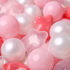 TRENDPLAY Pink and cream star balls decorate parties while sparking creative play.