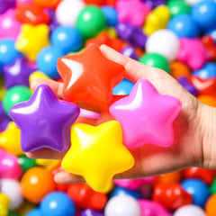 TRENDPLAY rainbow star balls close-up, vibrant colors and star shapes for tactile fun.