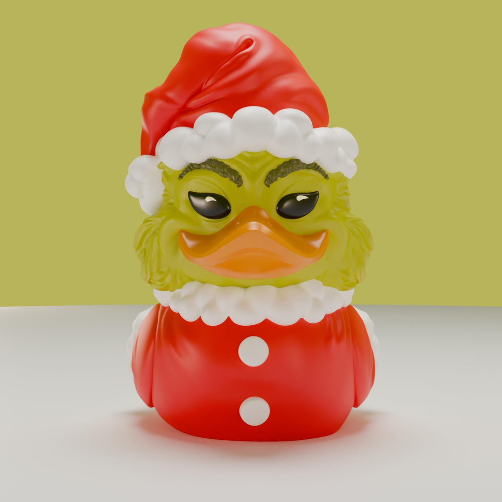TUBBZ Grinch miniature duck on desk, festive decor and conversation piece.