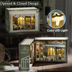 TuKIIE dollhouse kit panels and colorful instructions guide your build