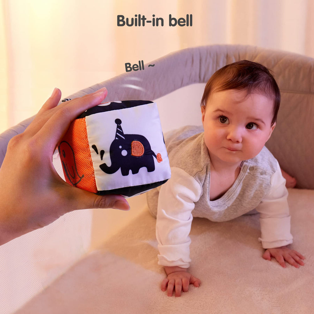 TUMAMA soft rattle provides gentle sound for infant engagement.