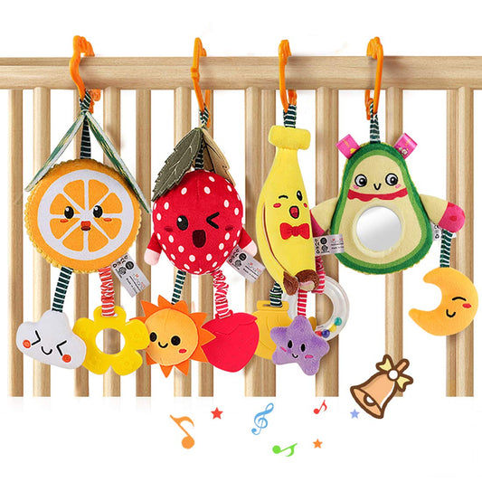 TUMAMA KIDS avocado fruit rattle hanging enhances visual tracking and gentle playtime exploration.