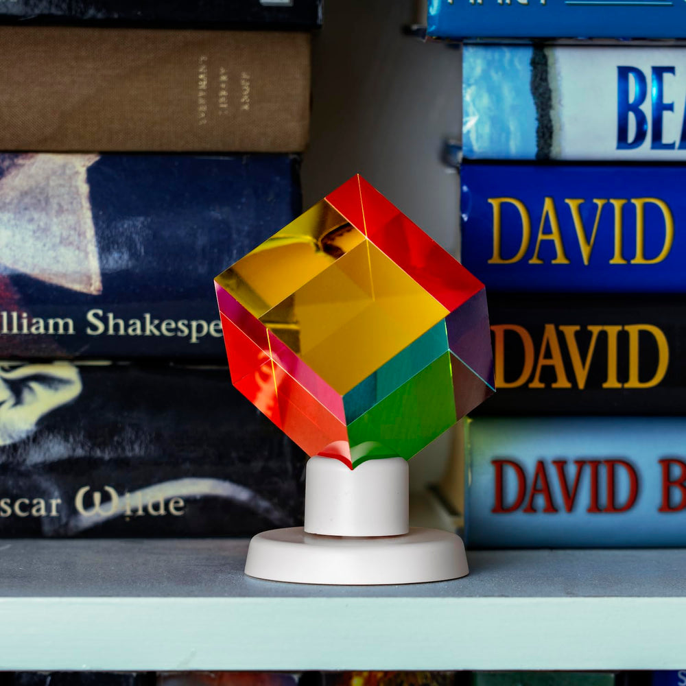 Twiddler Toys cyan-yellow-magenta acrylic prism showing color spectrum for creative exploration