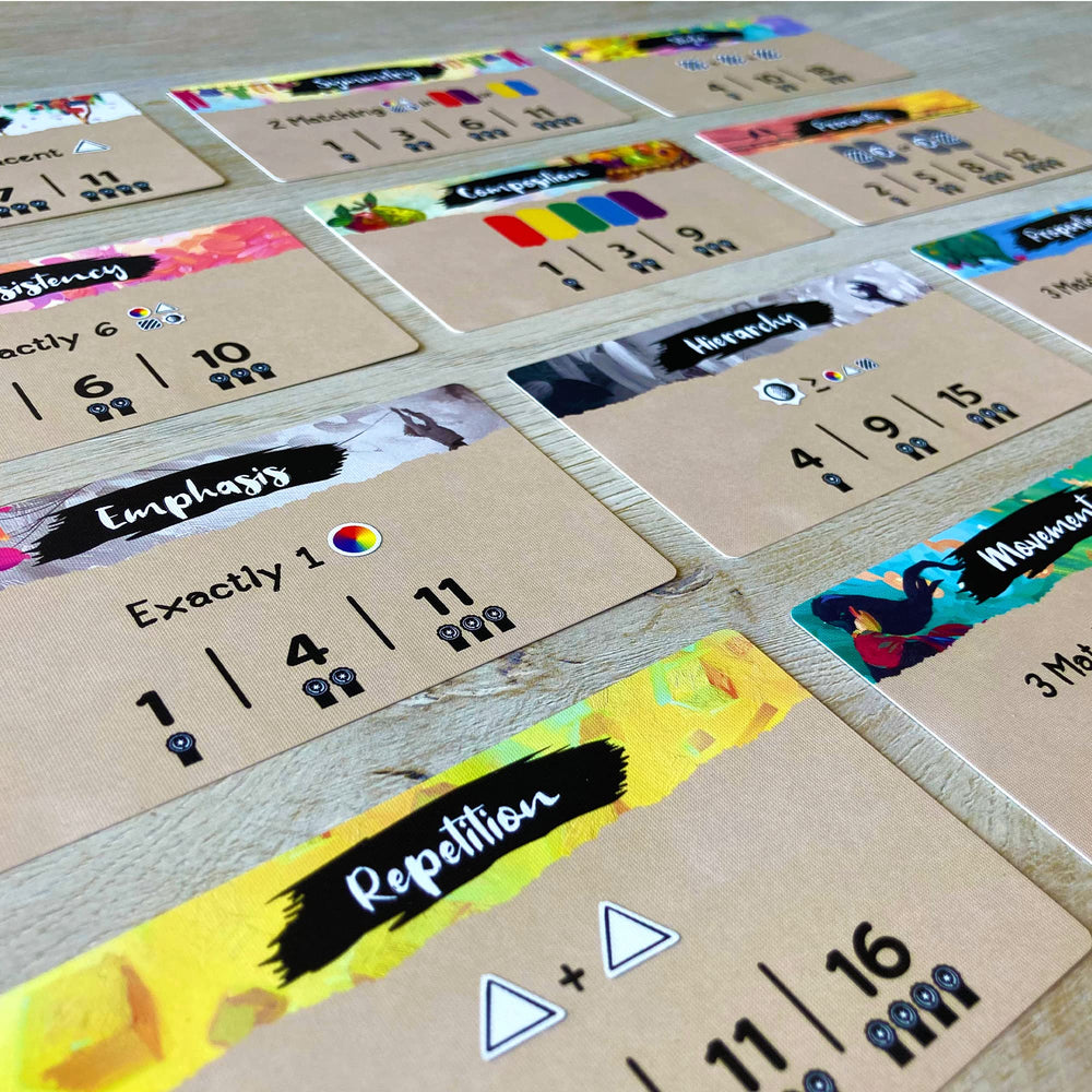 Tycoon Games Canvas players gathered around a table enjoying art-driven strategy.