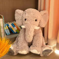 UBABER elephant plush close-up of textured ears showing lifelike detail and charm.