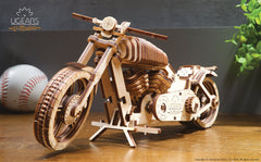 UGEARS Bike DIY Kit package content lists all parts for a complete build.