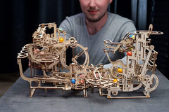 UGEARS build process for a DIY model emphasizes careful, tactile assembly.