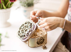 UGEARS Treasure Box jewelry storage in secure inside cavity.