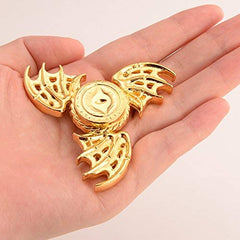Umnodobn Dragon fidget spinner decorative display piece on desk.