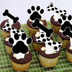 Umoni dog paw and bone toppers enhance themed dessert displays.