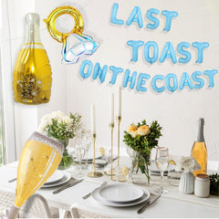 Uniticber diamond ring balloon accents the decor with a luxe coastal vibe.
