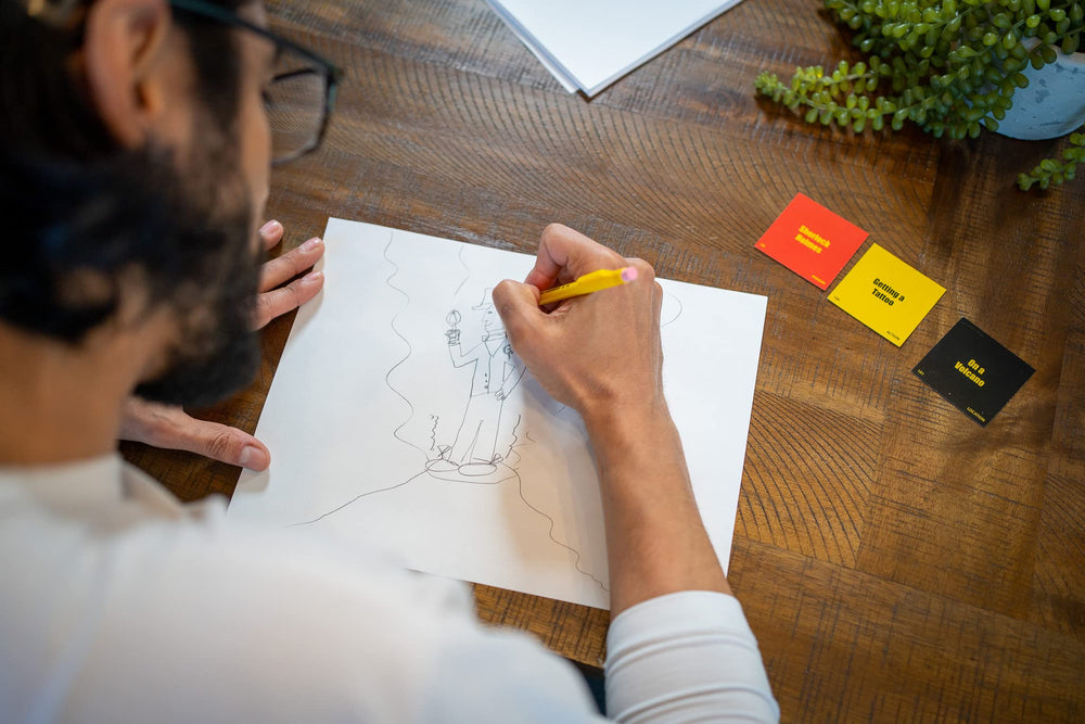 Players laughing during Don't Drink and Draw party moment.