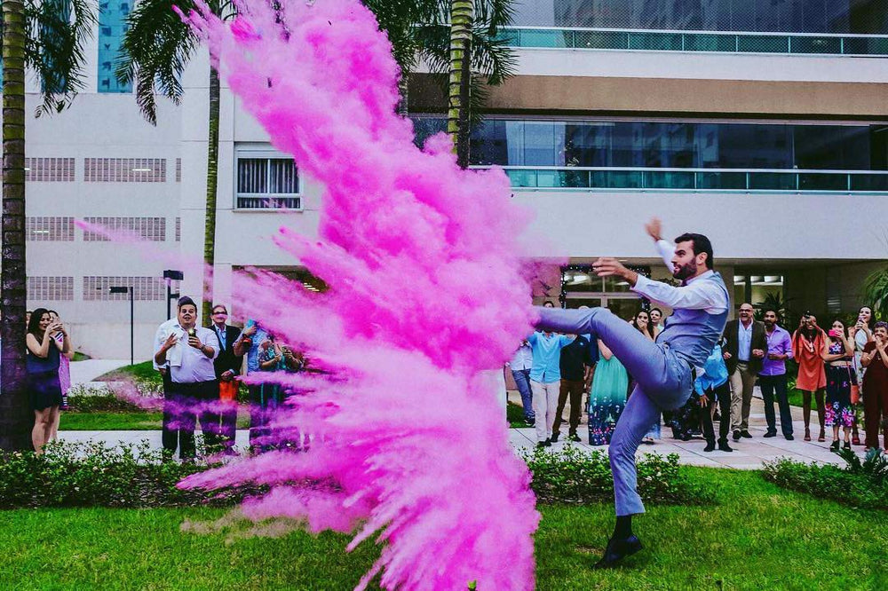 UP Shop family celebration moments captured with vibrant powder bursts.