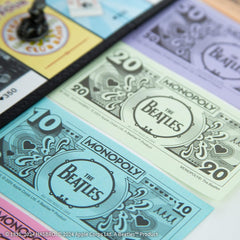 USAOPOLY Beatles token Octopus Garden, whimsical centerpiece for gameplay.