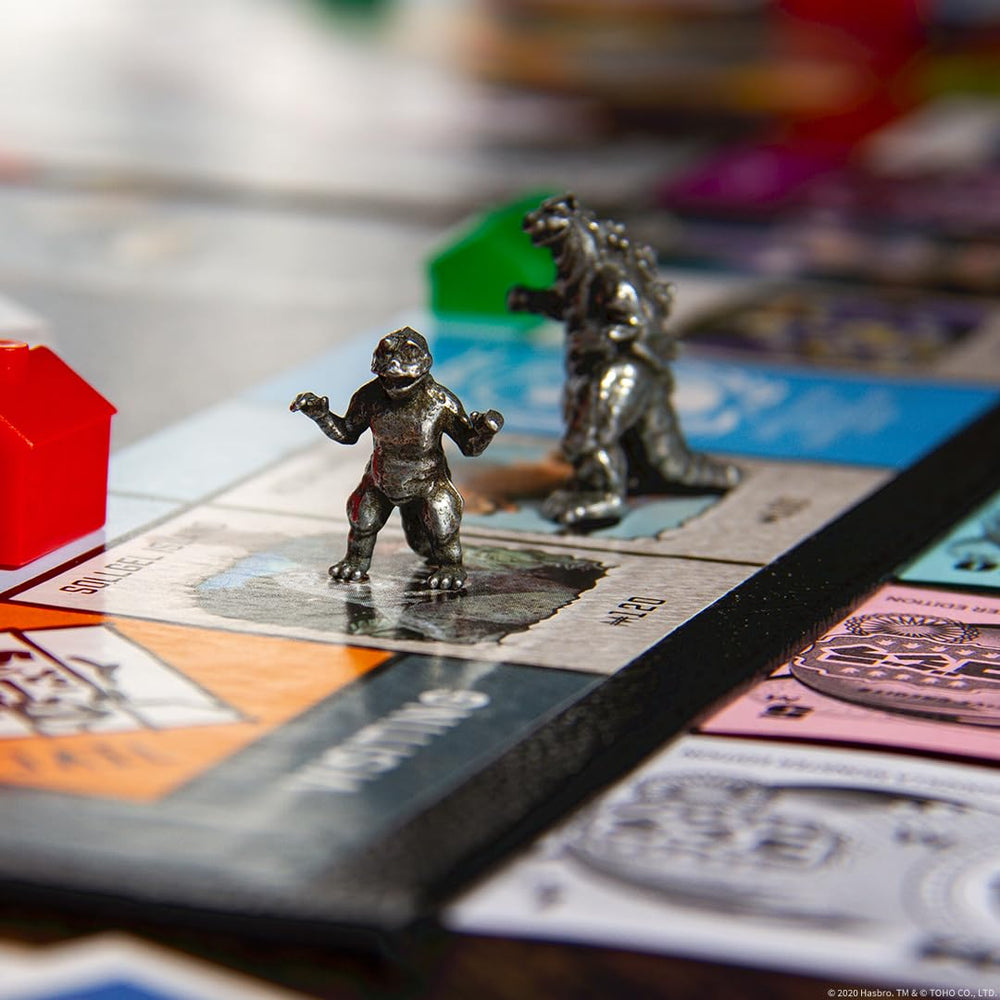 USAOPOLY Godzilla Tower Cards bring event flair to rounds.