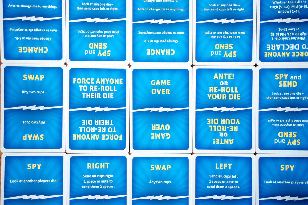 USAOPOLY What The Cup! bases keep dice stable during play