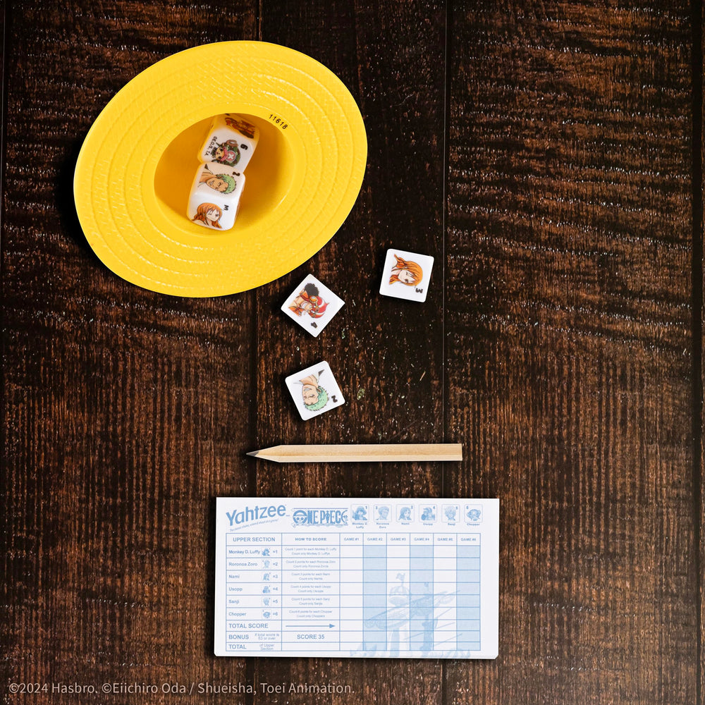 USAOPOLY Yahtzee packaging highlights the official One Piece license.