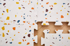 Valioza Terrazzo Playmat uses 60 cm tiles for flexible layouts.