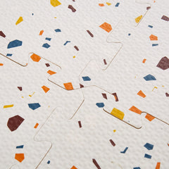 Valioza Terrazzo Playmat includes border edges for neat boundaries.