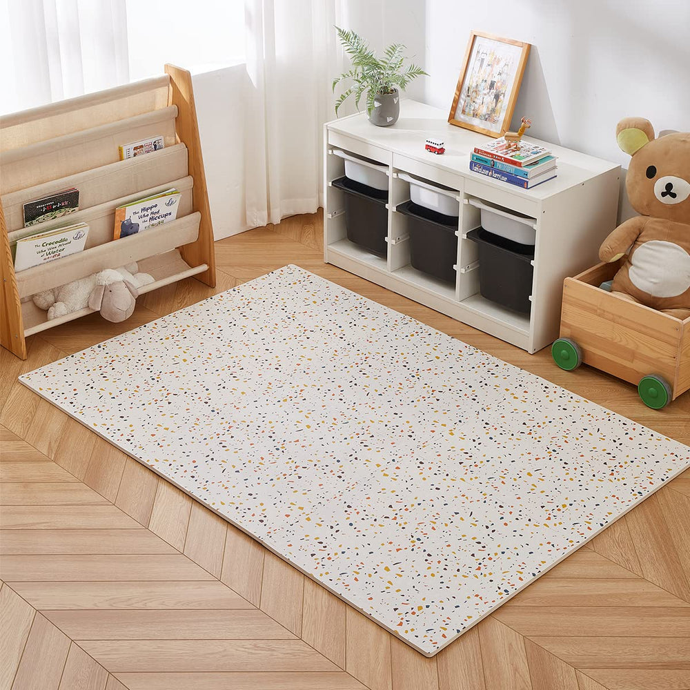 Valioza Terrazzo Playmat supports tummy time and early movement with cushioned comfort.