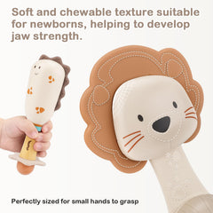 Vanplay ergonomic rattle fits tiny hands for independent play.